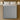 Overhead top-down view of the Springfit Autograph Prive mattress showing its full grey high-GSM melange tufted fabric surface on a bed with two white pillows and flanking globe wall lamps
