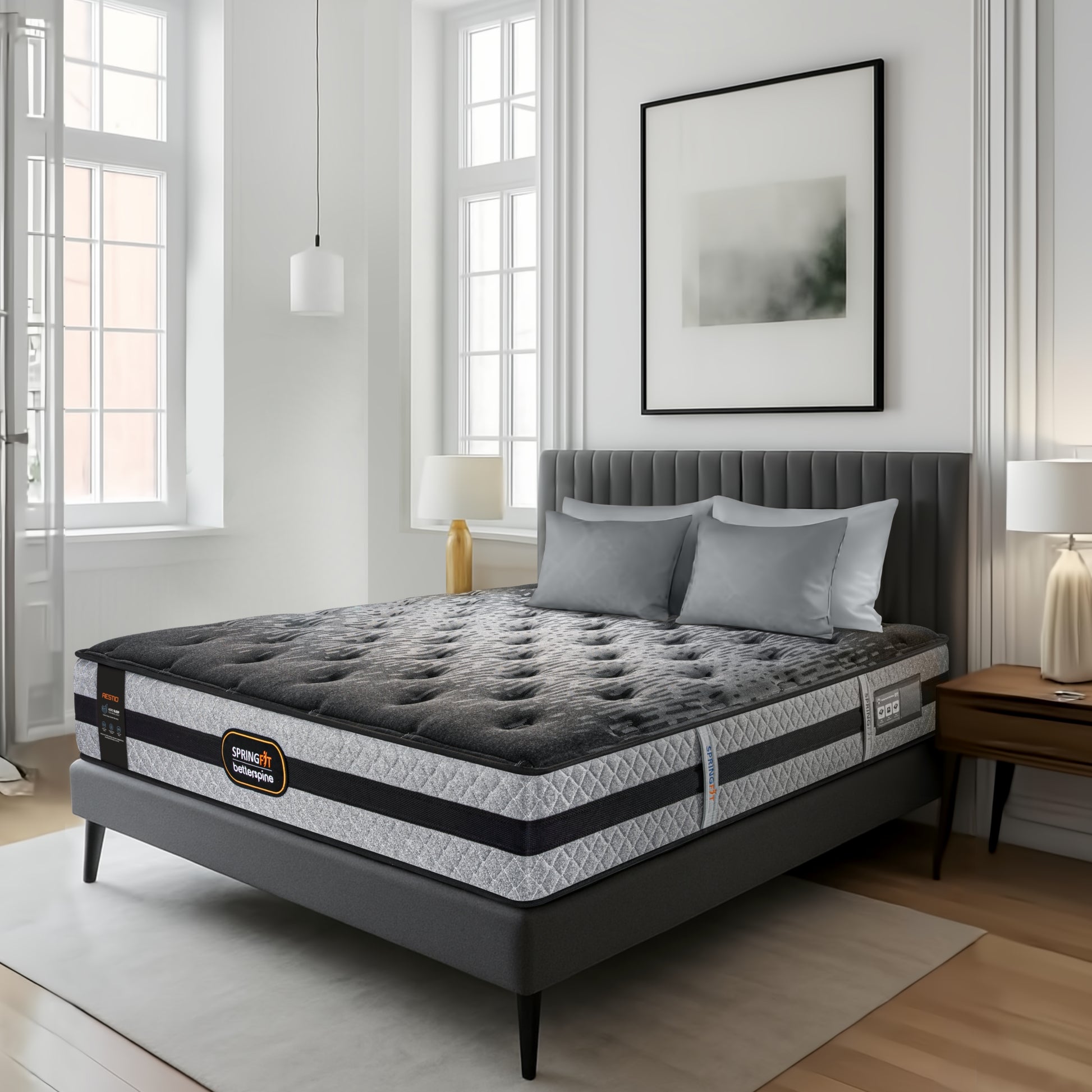 Springfit BetterSpine Restio mattress placed on a dark grey upholstered bed frame in a modern bedroom setting