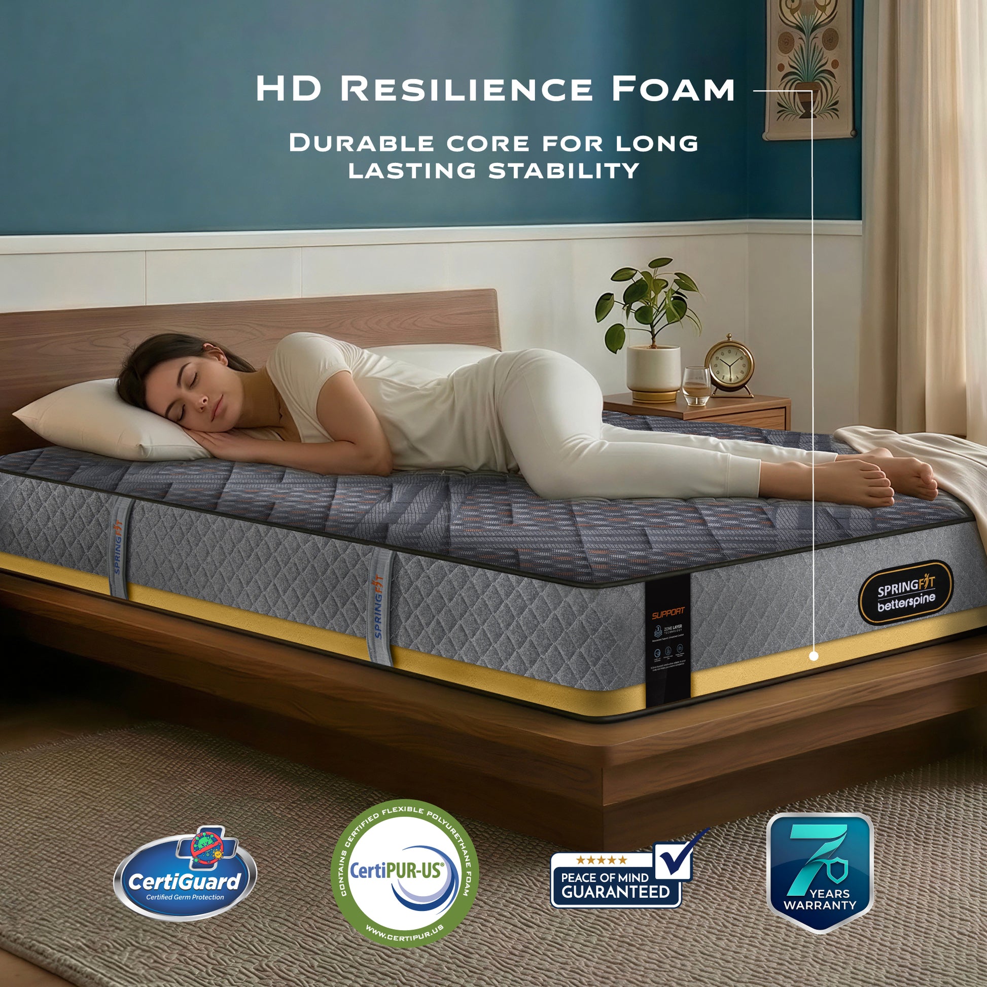 SpringFit BetterSpine Support mattress with HD Resilience Foam feature highlight; woman sleeping on her side on a grey and gold quilted mattress in a cozy bedroom setting; CertiGuard, CertiPUR-US certified with 7 Years Warranty
