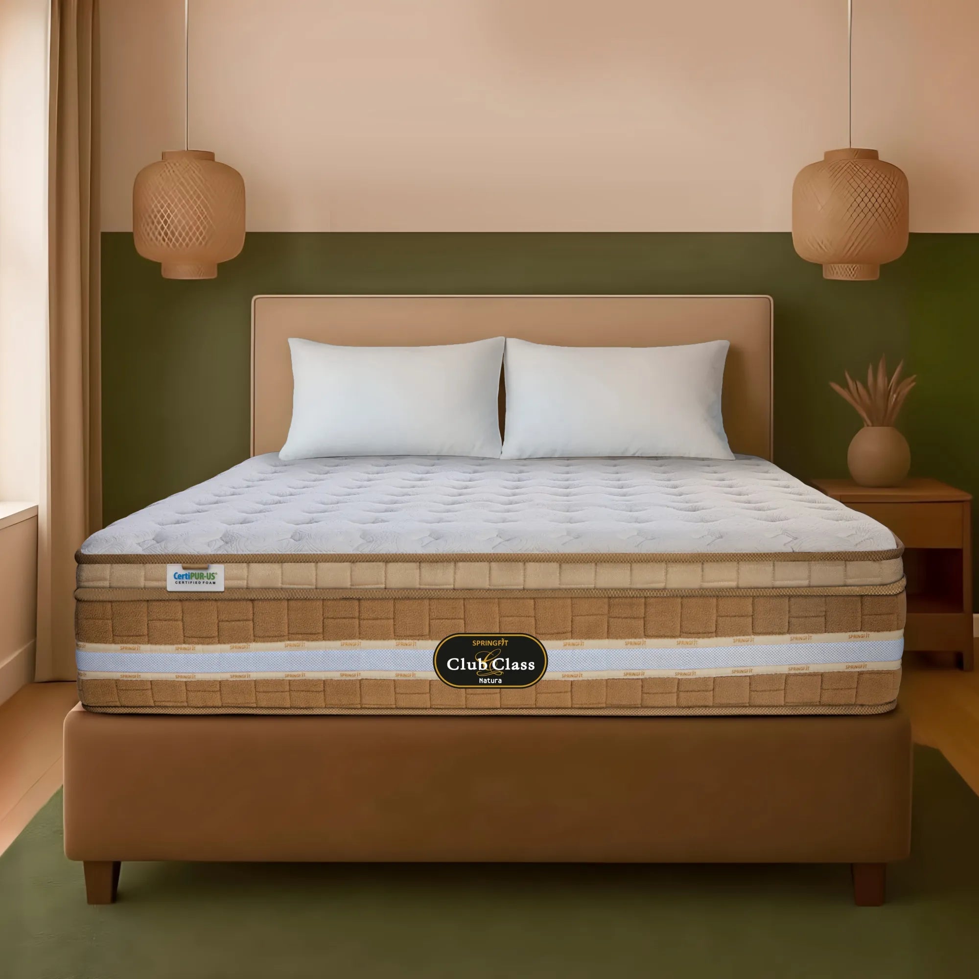 Springfit Club Class Natura mattress on brown platform bed with two white pillows in earthy peach and olive green bedroom with twin rattan pendant lights and decorative dried grass vase