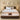 Front view of Springfit Emporio Grand Royce mattress with ornate white and gold fabric top on dark platform bed with white pillows in a warm beige bedroom