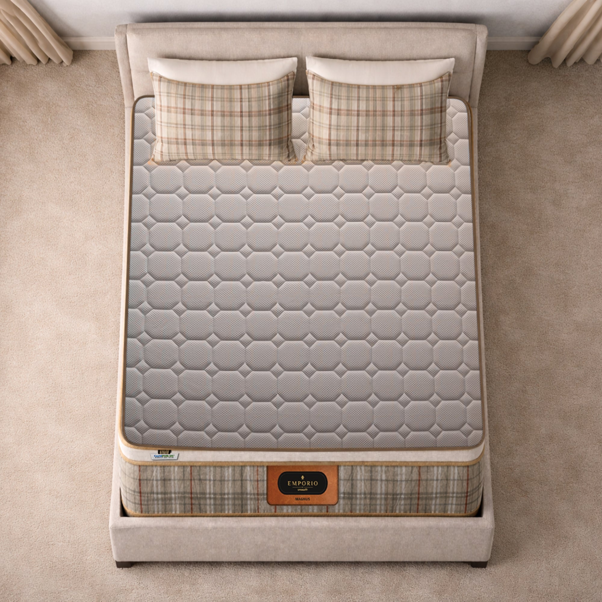Overhead top-down view of the Springfit Emporio Magnus mattress showing its full grey geometric octagon-quilted fabric surface on a beige upholstered bed with two plaid pillows
