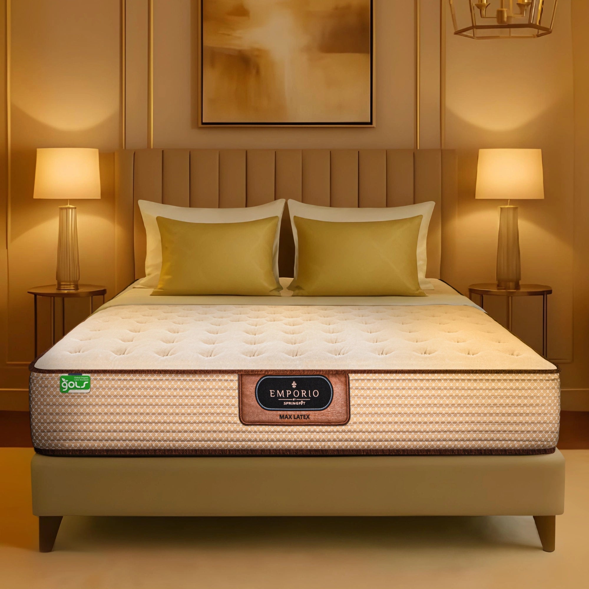 Front view of Springfit Emporio Max Latex mattress with cream velour top and gold accent pillows on a beige bed frame in a luxury golden bedroom