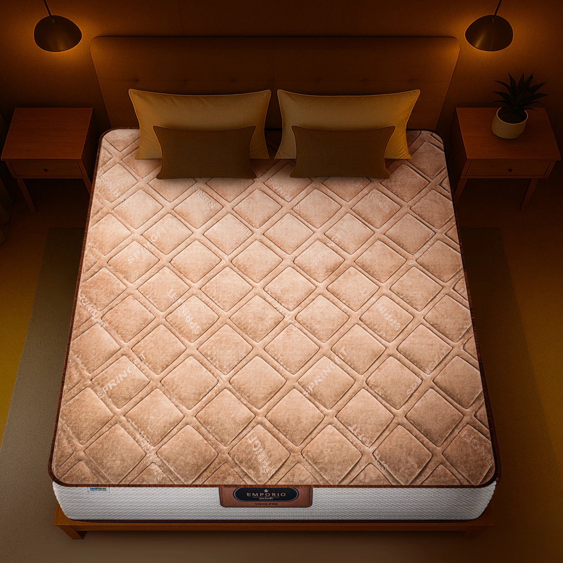 Overhead top-down view of the Springfit Emporio Visco Pro mattress showing its full brown velour diamond-quilted surface with an all-over Springfit brand text pattern, on a wooden bed with ochre and olive cushions under warm pendant lighting