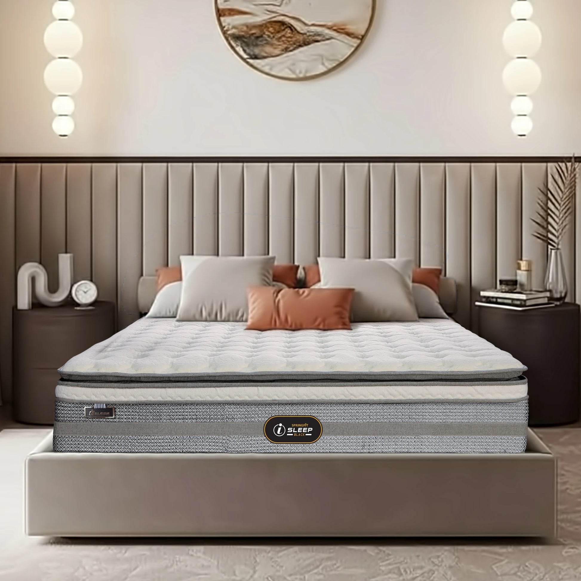 Front view of Springfit iSleep Black mattress with cream quilted pillow top and terracotta accent pillows on a beige upholstered bed in a neutral bedroom