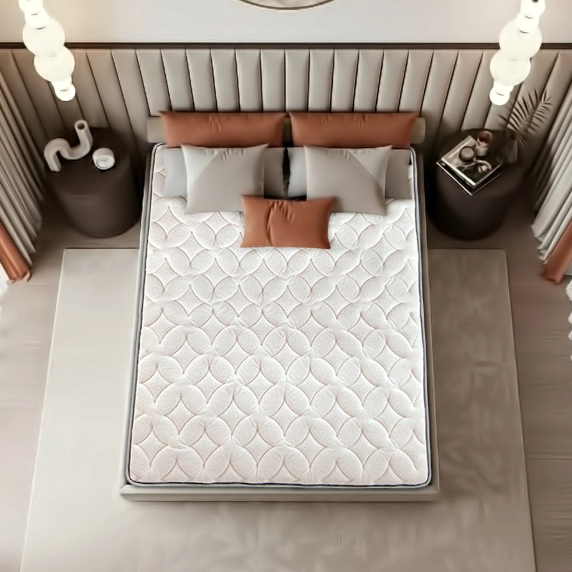 Top-down view of Springfit iSleep Black mattress showing cream scallop-pattern quilted fabric surface with terracotta and grey accent pillows