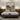 Front-facing view of the Springfit iSleep Krono mattress with a white honeycomb-textured top and dark patterned fabric border, displayed on a dark walnut low platform bed in a warm contemporary bedroom with wicker pendant lights and a nature landscape artwork