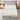 Bird's-eye top view of the Springfit iSleep Ortho mattress showing its full scallop-patterned quilted surface on a grey upholstered bed with flanking nightstands