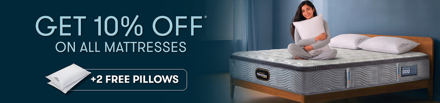 Springfit mattress desktop banner promotional offer showing get 10% off on all mattresses plus two free pillows with a woman sitting on a Reactive foam bed.