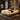 Springfit ProActiv Back mattress on beige platform bed in warm-lit luxury bedroom with dark wood paneling, wall sconces, and brown accent decor