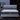 Springfit ProActiv Jump mattress on grey upholstered bed with diamond tufted headboard in modern dark bedroom setting, front view