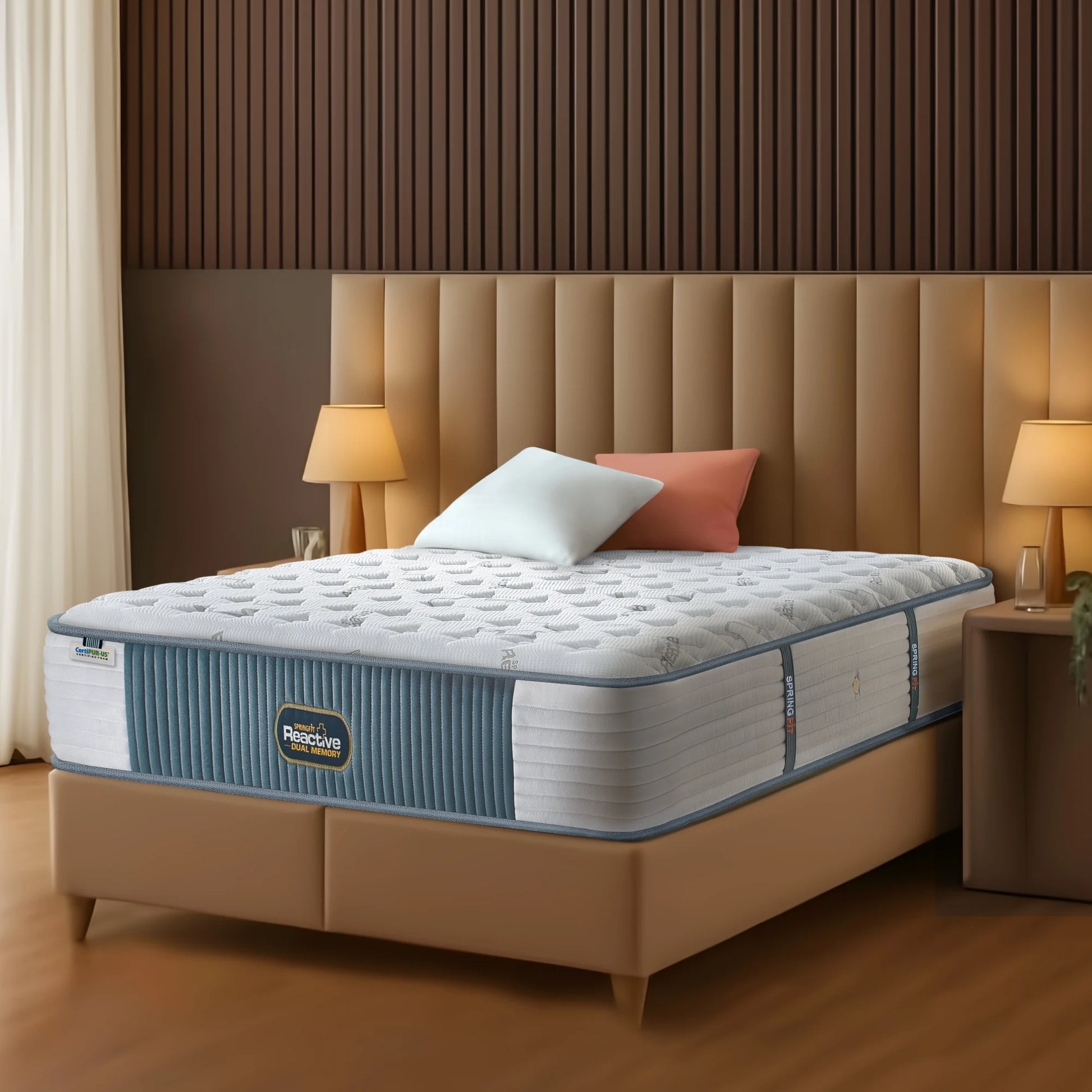 Springfit Reactive Dual Memory mattress on beige channeled platform bed with light blue and terracotta pillows in warm wood-paneled luxury bedroom with golden side lamps