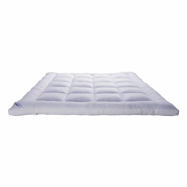 Flat standalone top-angled view of Springfit mattress topper displaying white quilted tufted surface laid flat on white background