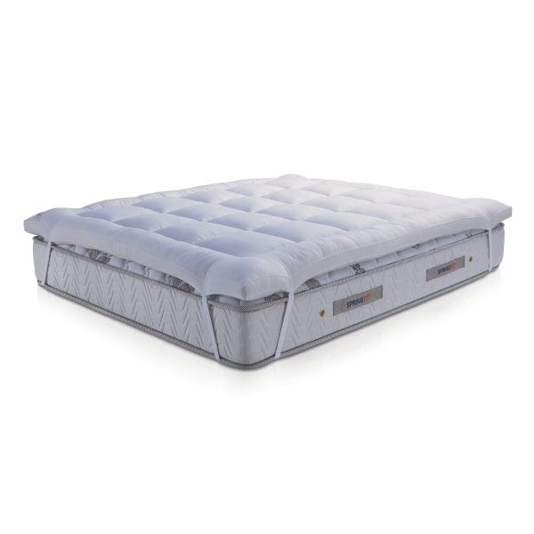 Side profile view of Springfit mattress topper showing plush loft depth and thickness with white quilted top and flat base on white background